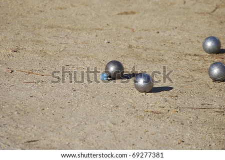 Petanque balls on the ground. Fun and relaxing game