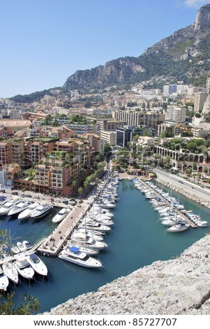 Luxury boats in Monaco Harbor. View from Monte Carlo. French riviera. Blue Coast. Mediterranean Sea.