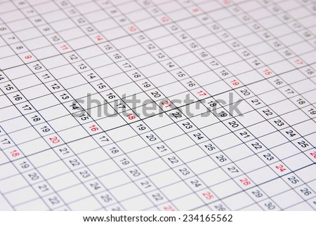 Close up view of day numbers in an annual planner. Calendar dates