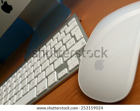 MADRID, SPAIN - FEB 8, 2015 Apple Computer iMac, with an spanish wireless keyboard and a mouse. Apple Macintosh iMac are one of the best computers today