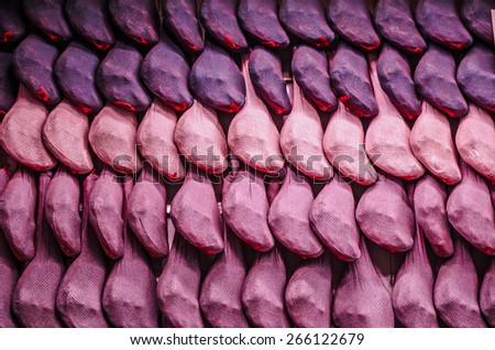 Iberian serrano hams hanging in the store. Serrano ham is the typical spanish ham