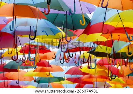 Parasol. Multicolored umbrellas. Color umbrellas urban decoration. Multicoloured umbrellas