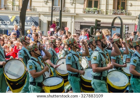 MADRID, SPAIN - OCTOBER 12, 2015: Spanish legionnaries military band marching and playing drums in the military parade of the Spanish National Day