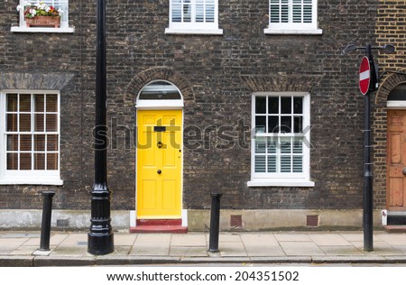 Yellow house door on a London street