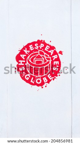 LONDON, UK / CIRCA JUNE 2014 - Logo of Shakespeare\'s famous Globe Theater, seen on a white wall on the Southbank
