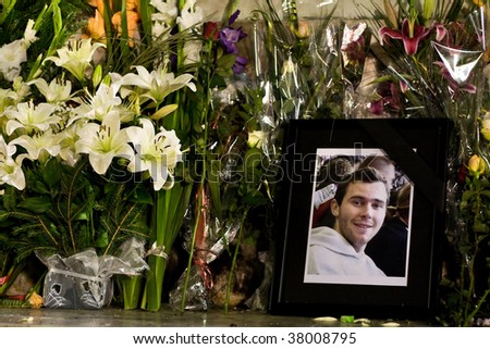 stock-photo-belgrade-sept-people-leave-flowers-for-french-national-brice-taton-september-in-38008795.jpg