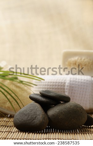 zen stones and spa set on the wood for treatments