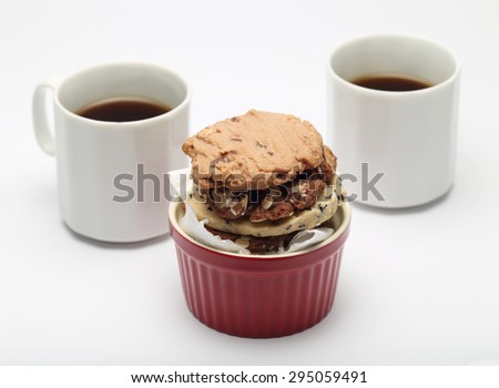 The many cookies inside ceramic cup cake and coffee cup set for relax and break from meeting