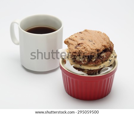 The many cookies inside ceramic cup cake and coffee cup set for relax and break from meeting