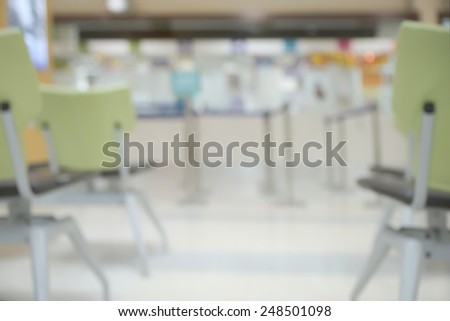 Abstract blurry empty waiting queue in front of medical counter background