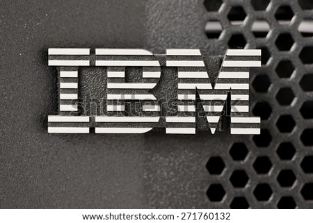 Bangkok, Thailand - March 19, 2015: Closeup of silver IBM logo over huge pSeries server black color rack lid mesh