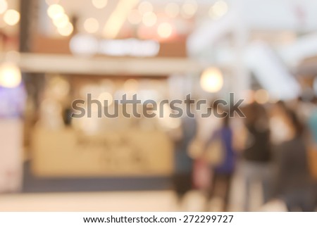 Abstract blurry dessert shop with crowded in queue background