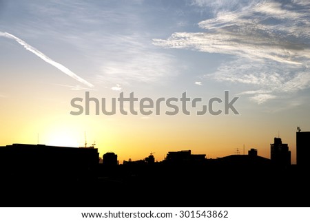 Bangkok city silhouette in early morning orange light background