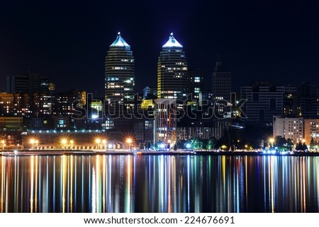 Night in Dnipropetrovsk - skyscrapers and dark river