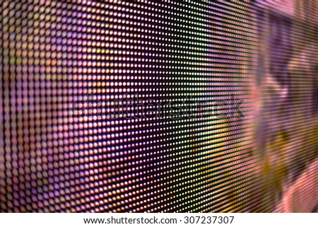 Rainbow colored LED screen mesh close up