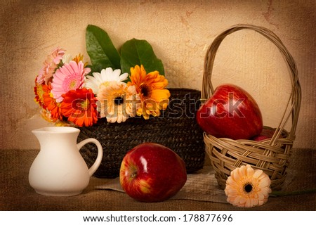 still life with bouquet of flowers in a basket