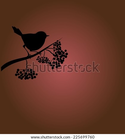Brown autumn background with black silhouette bird on rowan tree