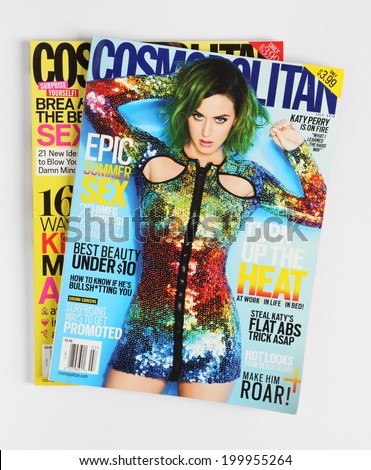 PRAGUE, CZECH REPUBLIC - JUNE 14, 2014: stack of US edition of magazine Cosmopolitan, on top issue July 2014 with Katy Perry on cover, on display in Prague, Czech republic in June 2014