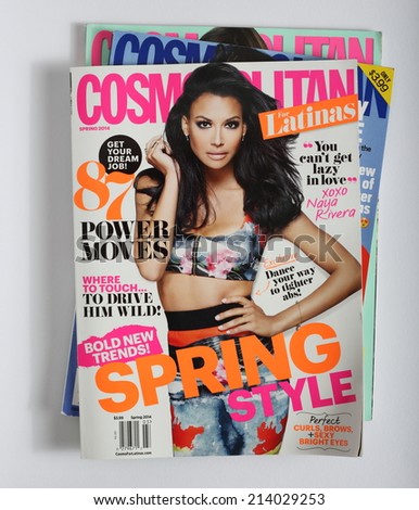 MALESICE, CZECH REPUBLIC - AUGUST 22, 2014: stack of magazine Cosmopolitan, on top issue For Latinas Spring 2014 with Naya Rivera on cover, on display in Malesice, Czech republic in Aug 2014