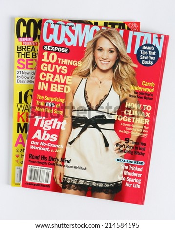 MALESICE, CZECH REPUBLIC - JUNE 14, 2014: stack of US edition of magazine Cosmopolitan on top issue May 2007 with Carrie Underwood on cover, on display in Malesice, Czech republic in June 2014