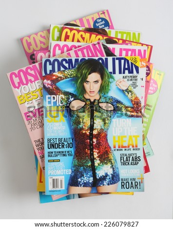 PRAGUE, CZECH REPUBLIC - JUNE 14, 2014: stack of US edition of magazine Cosmopolitan, on top issue July 2014 with Katy Perry on cover, on display in Prague, Czech republic in June 2014