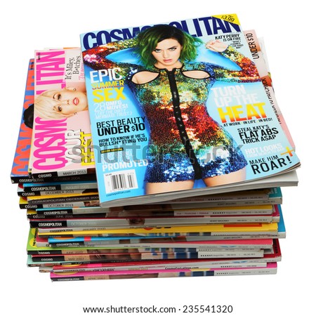 MALESICE, CZECH REPUBLIC - MAY 02, 2014: stack of US edition of magazine Cosmopolitan, on top issue July 2014 with Katy Perry on cover, on display in Malesice, Czech republic in May 2014