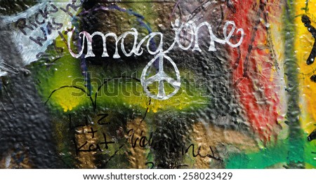 PRAGUE, CZECH REPUBLIC - MARCH 03. 2015: The Lennon Wall since the 1980s is filled with John Lennon-inspired graffiti and pieces of lyrics from Beatles songs on March 03, 2015 in Prague.