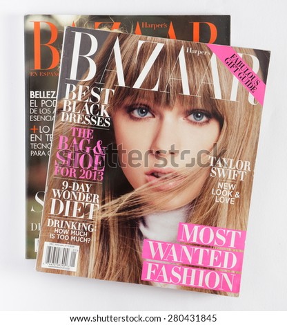 MALESICE, CZECH REPUBLIC - MAY 21, 2015: Stack of magazines Harpers Bazaar, on top issue December 2012, January 2013 with Taylor Swift on cover on display in Malesice, Czech republic in May 2015.