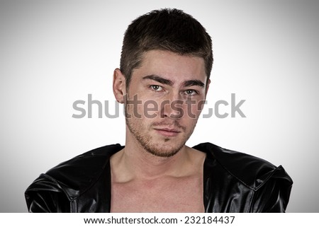Photo of brunet young man on light background