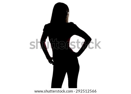 Silhouette of woman with hands on hips, half turned on white background