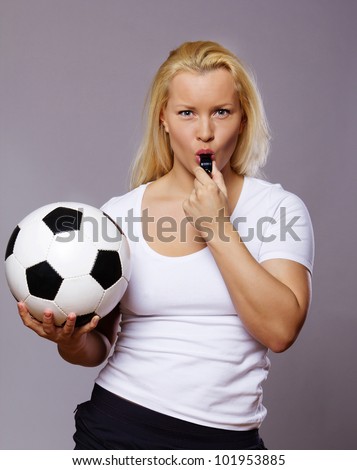 Image of soccer coach with ball