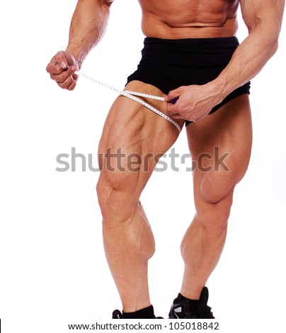 Close portrait of muscle man legs