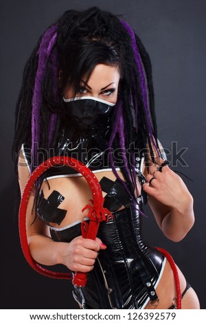Beautiful goth girl in artistic photo session