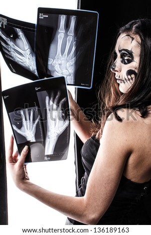 Image of a zombie girl and a few x-ray images