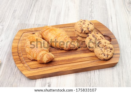 Cutting board with different baked goods