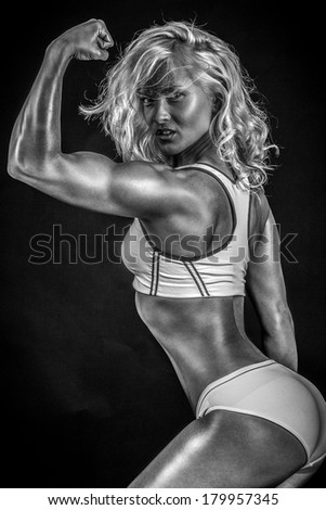 Black and white photo of a blonde bodybuilder