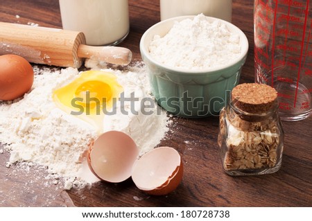 An egg in flour and oats in a jar