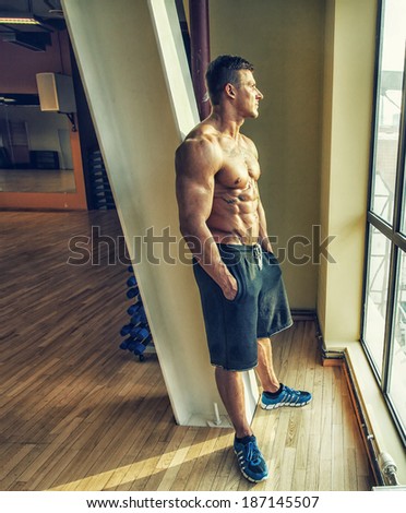 Image of a sportsman who is staring in window