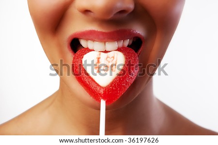 Picture of bitten candy, shiny lips