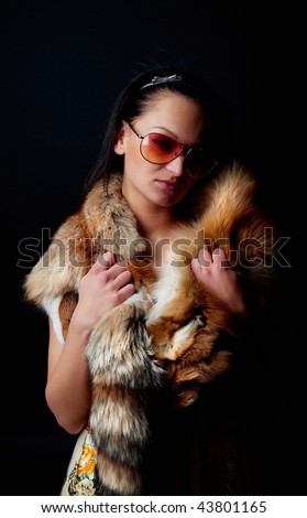 Picture of beautiful woman wearing fox fur