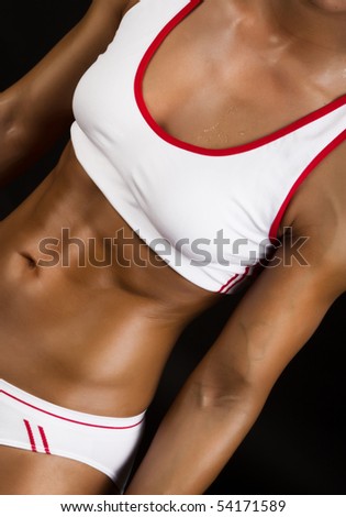 stock photo Picture of muscular girl's torso