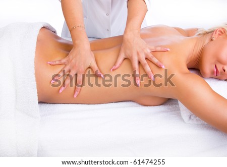 Hands on blond woman back