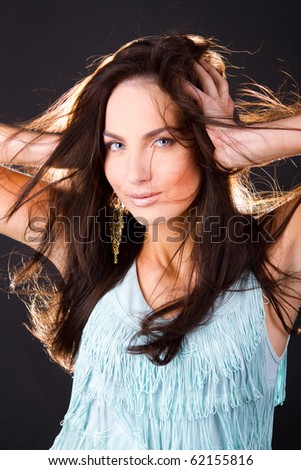 Woman holding hands on head