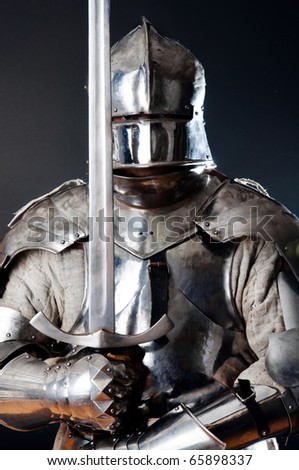 Ancient warrior in iron helmet
