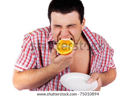 Man Eating Orange
