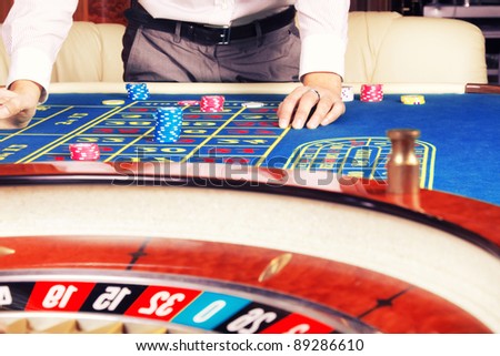 Image of casino roulette wheel and table