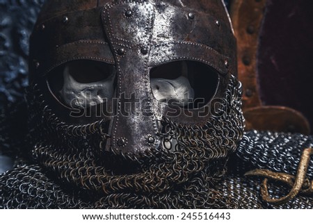 Picture man\'s skull in the helmet on chain armour