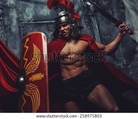 Roman warrior with muscular body fights