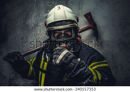 Rescue firefighter in safe helmet and uniform over grey background.
