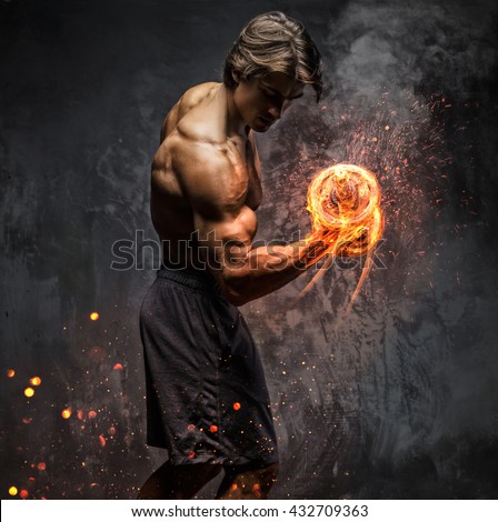 Art portrait of a man with burning dumbbell.